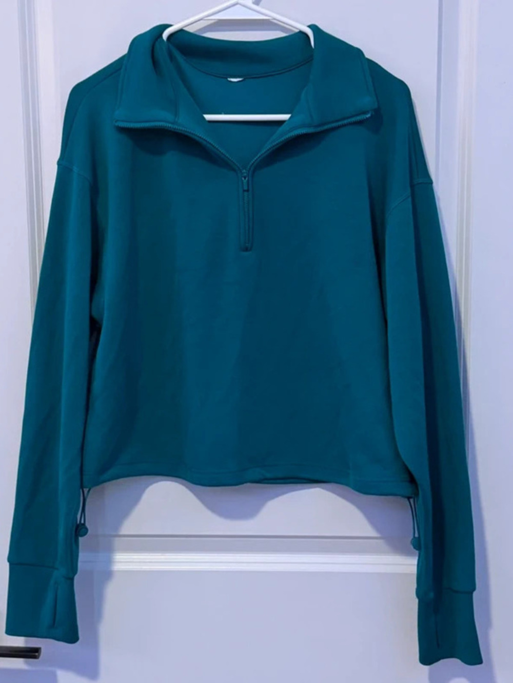 Women’s size large turquoise cropped quarter zip